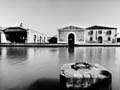 La Darsena Vecchia con la Casa del Bucintoro (al centro) - L'Edificio delle Vele (a destra) – Uno dei Cantieri Acquatici (a sinistra)