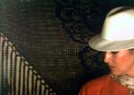 Ritratto di donna con cappello bianco 1990